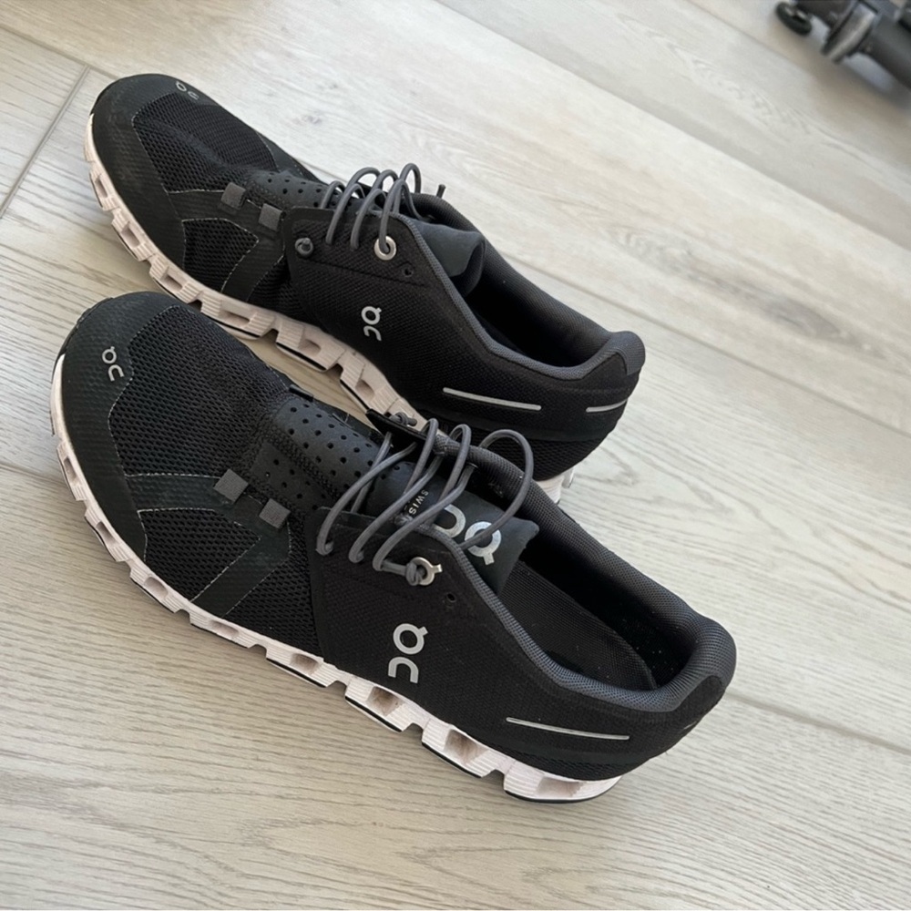 On Running Black and White Sneakers with Cushioned Support